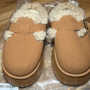 Thick, fuzzy slippers
